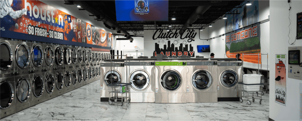 clutch city laundry interior store with washer and drying machines